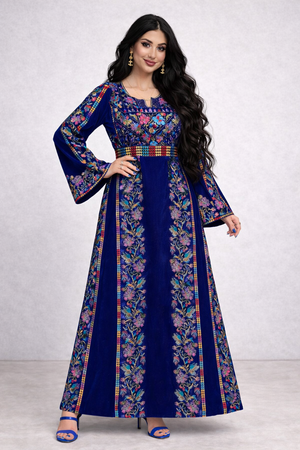 Alhaifawi | Woman wearing a long, floral-patterned dress with bell sleeves against a white background