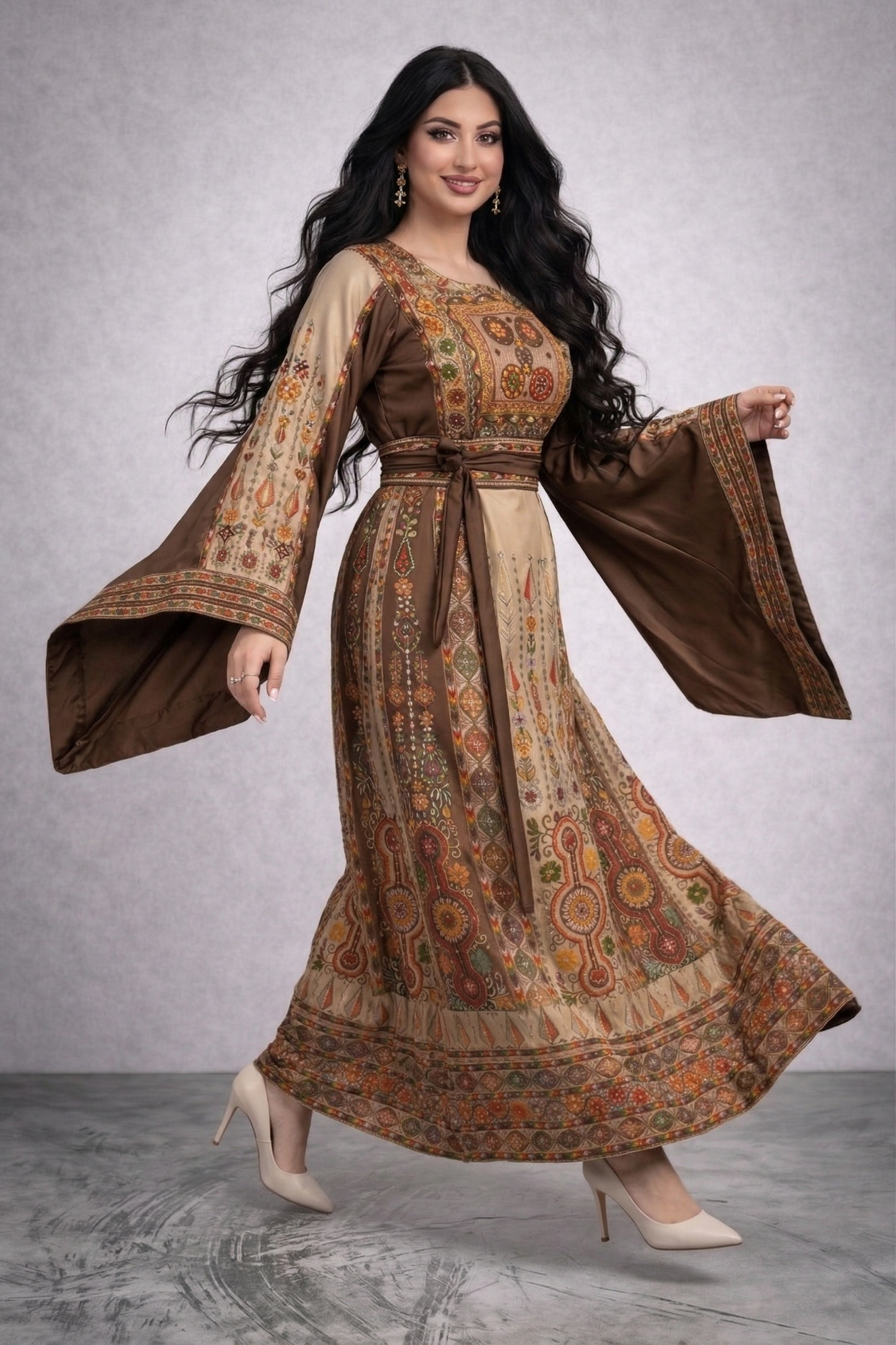 Alhaifawi | Woman wearing a traditional patterned dress with long sleeves on a plain background
